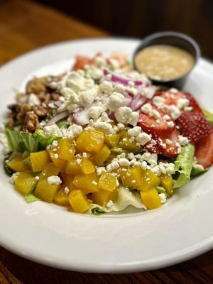 fruit & nuts topped salad